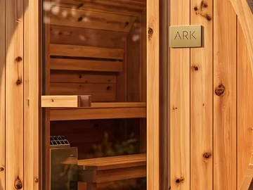 Detail: the glass door, the bench and the ARK plaque